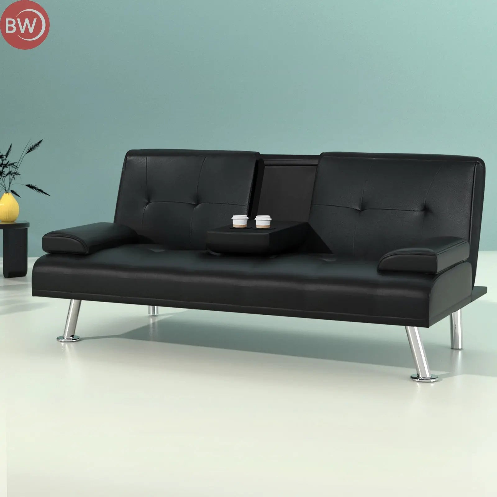 Black PU leather sofa bed with tufted back and curved armrests, chrome legs
